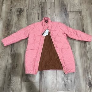 Never been worn brand new with tags it’s a size small petite